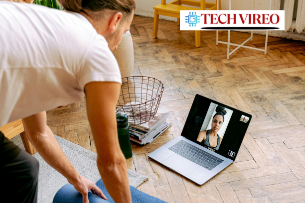 "Person holding head while looking at a bright screen"